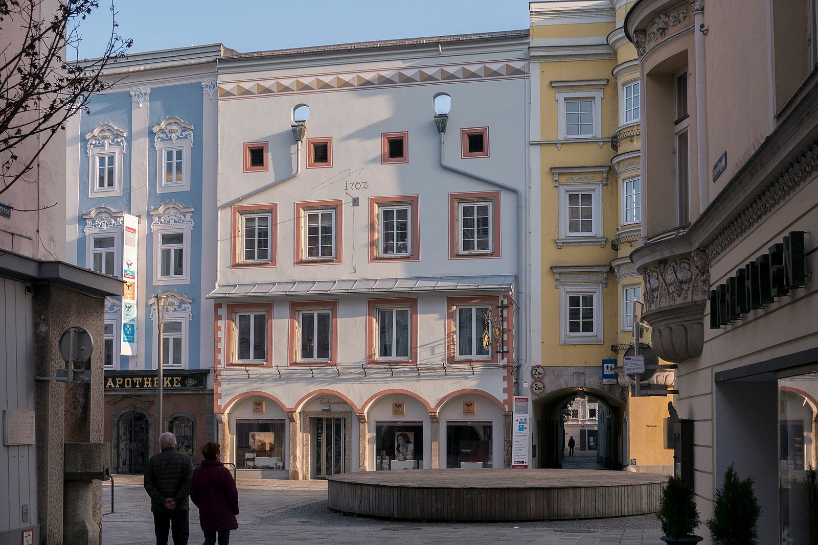 Historic façades and an archway at Stadtplatz in Wels