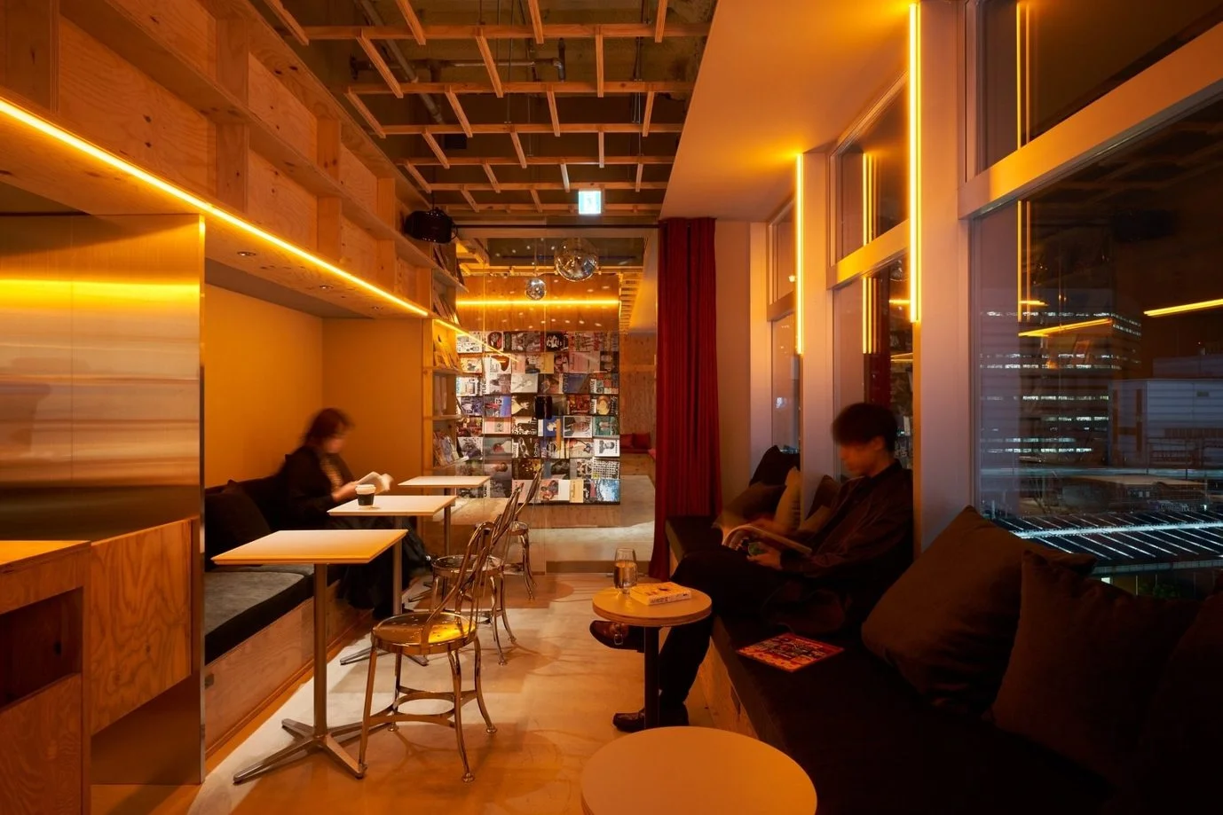 Bookshelves and sleeping spaces at Book and Bed Tokyo Shinjuku