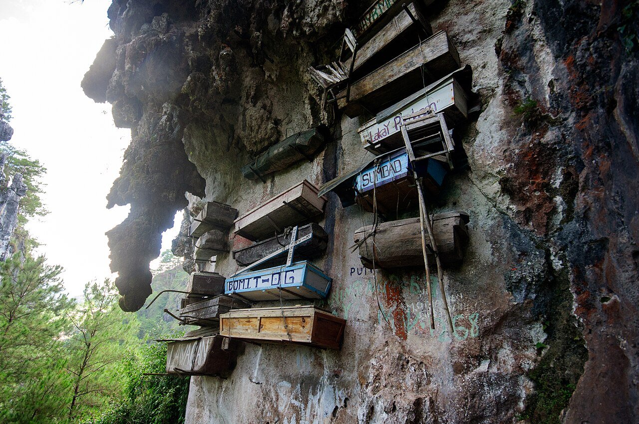 Wooden coffins suspended against the limestone cliff at Sagada, Philippines