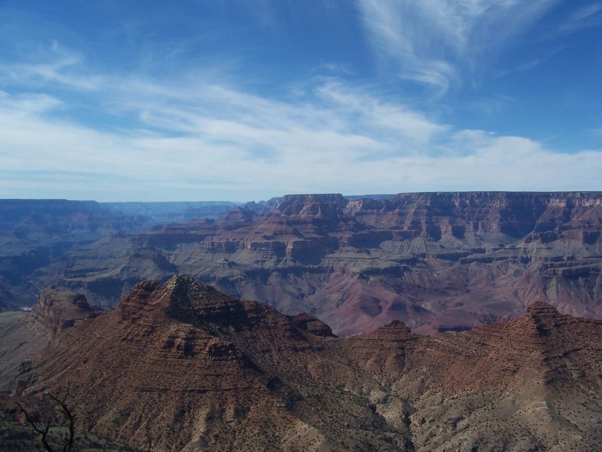 Majestic skies match the majesty of the Grand Canyon's cliffs and formations.