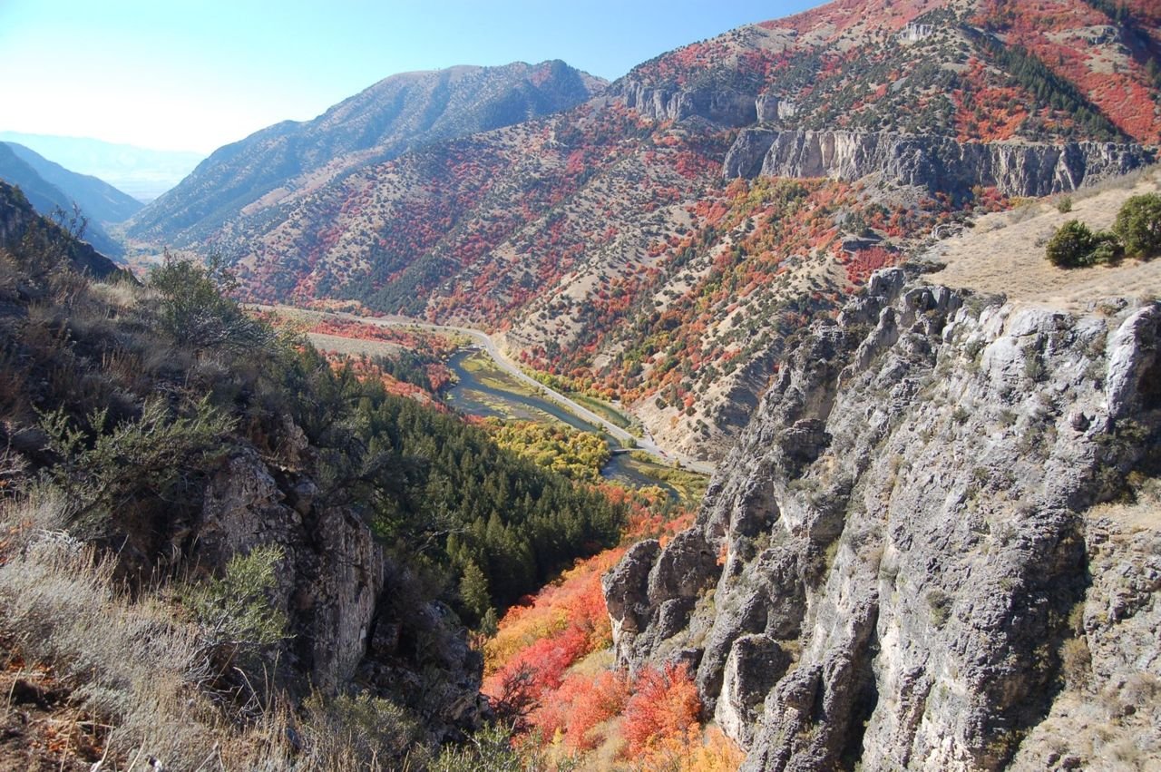 The Logan River and Logan Canyon Scenic Byway run along the bottom of Logan Canyon to Cache Valley in this autumn view from atop the China Wall on the Crimson Trail.