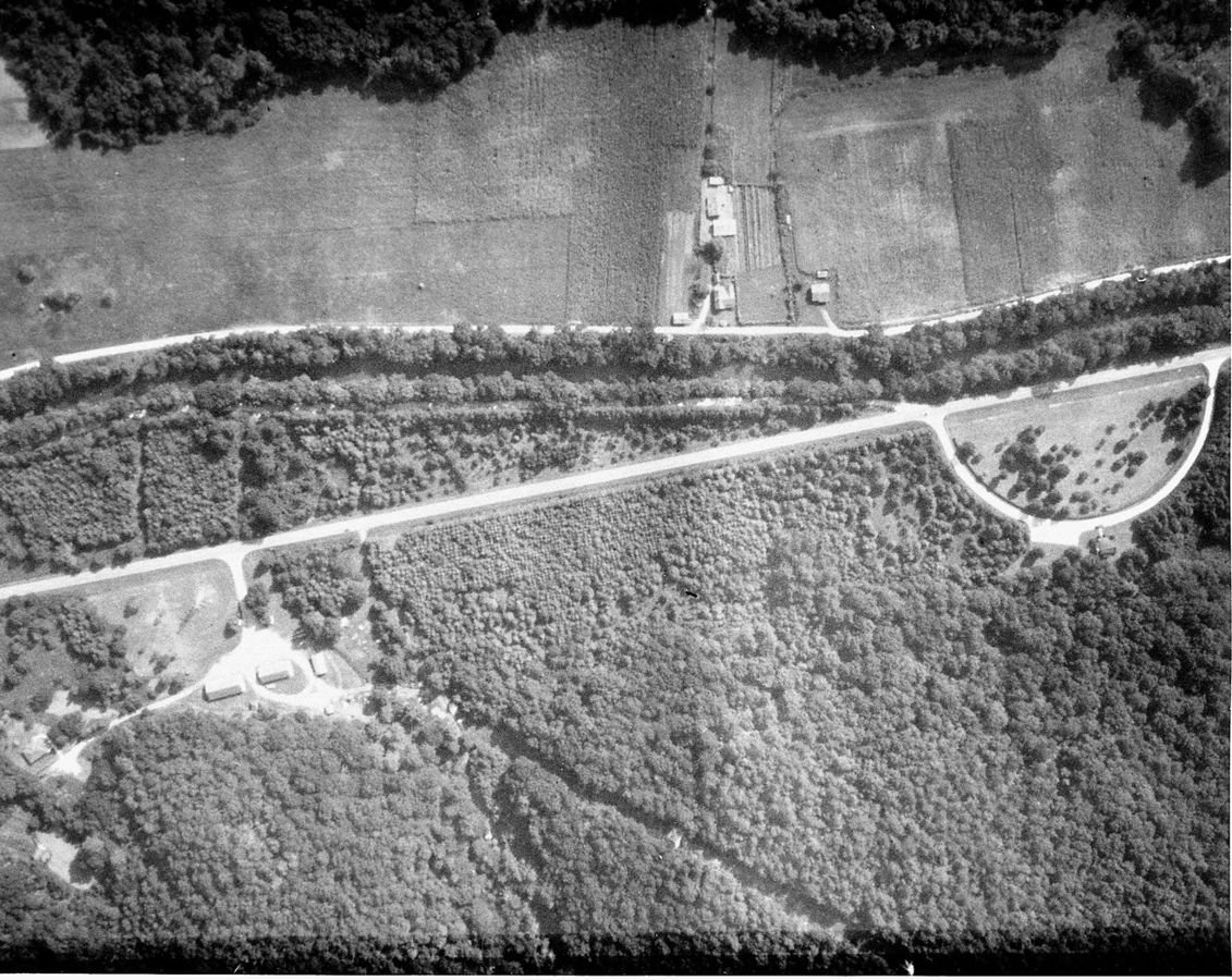 As shown in this aerial photograph, the area around the Forest Heritage National Scenic Byway was farmed during early community settlement.