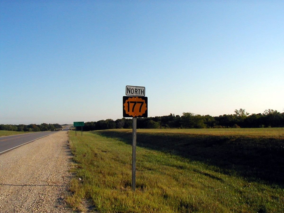 This road sign sits along the Flint Hills Scenic Byway, just east of El Dorado, 18 miles south of the route's beginning in Cassoday, Kansas.
