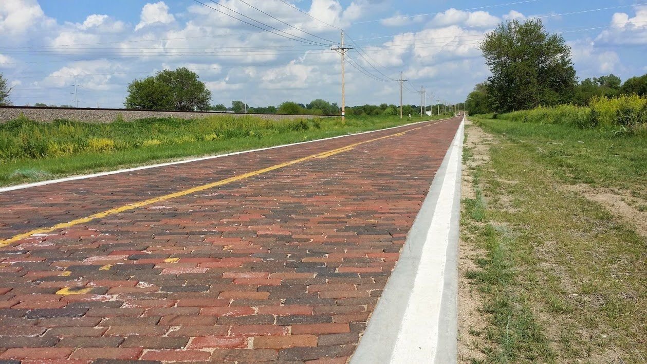 Early paving techniques of many sections of the Lincoln Highway across America included locally produced bricks, as in this section of the original 1913 route of the Lincoln Highway near Elkhorn Nebraska.